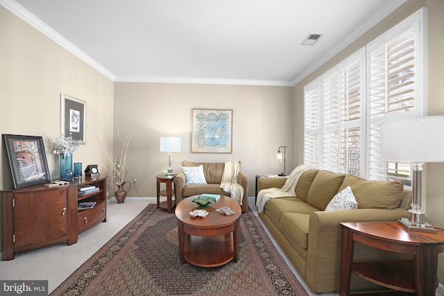13824 Custis Sq, Woodbridge, VA 22191 - living room with baseboards, visible vents, crown molding, and light carpet