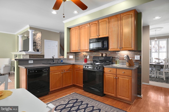 13824 Custis Sq, Woodbridge, VA 22191 - kitchen featuring crown molding, decorative backsplash, a sink, a ceiling fan, and black appliances