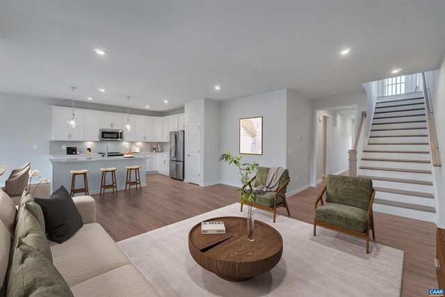2963 Rambling Brook Ln, Crozet, VA 22932 - living room with recessed lighting, stairway, light wood-style floors, and baseboards