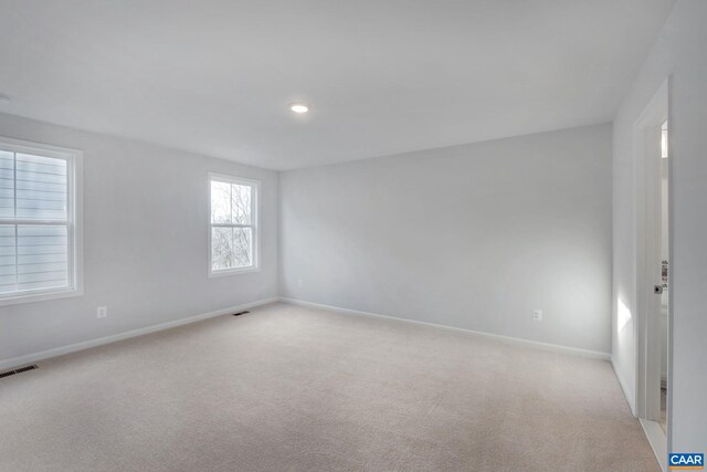 2963 Rambling Brook Ln, Crozet, VA 22932 - unfurnished room with visible vents, baseboards, and light colored carpet