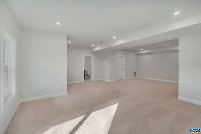 2963 Rambling Brook Ln, Crozet, VA 22932 - below grade area featuring visible vents, baseboards, recessed lighting, and light colored carpet