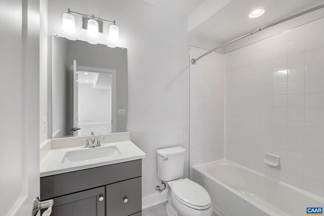 2963 Rambling Brook Ln, Crozet, VA 22932 - bathroom with toilet, vanity, baseboards, and shower / washtub combination