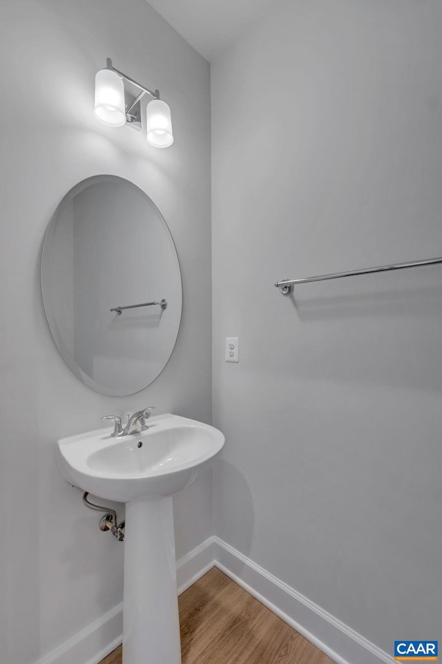 3041 Rambling Brook Ln, Crozet, VA 22932 - bathroom featuring baseboards and wood finished floors
