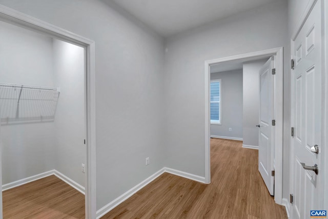 3041 Rambling Brook Ln, Crozet, VA 22932 - hallway with light wood-style flooring and baseboards