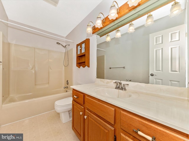bathroom with vanity, toilet, and shower / washtub combination