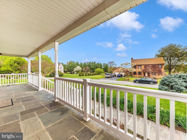 balcony featuring covered porch