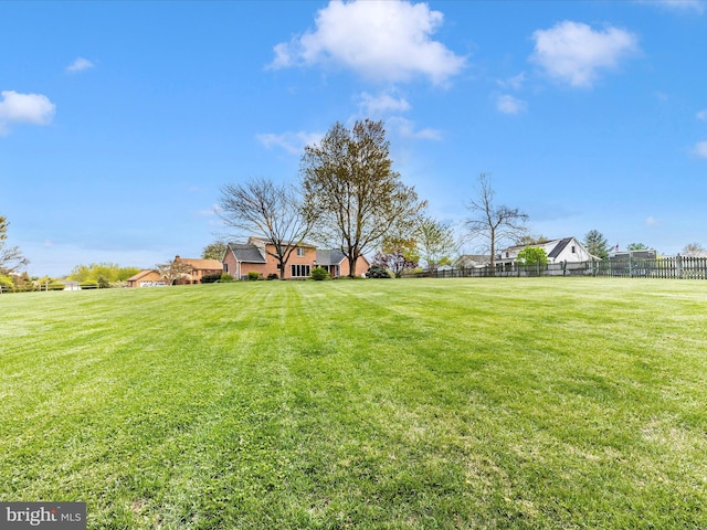 view of yard with fence