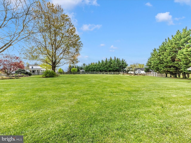 view of yard with fence