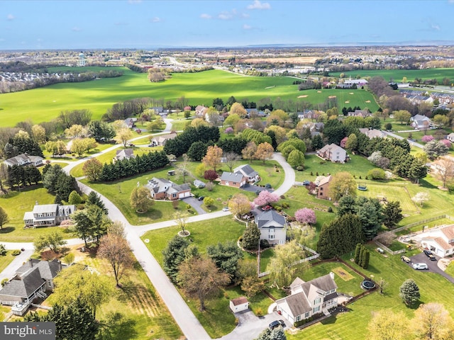 birds eye view of property featuring golf course view and a residential view