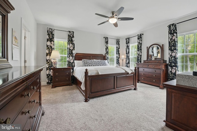187 Boxelder Dr, Stafford, VA 22554 - bedroom featuring ceiling fan, light carpet, and multiple windows