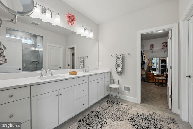 187 Boxelder Dr, Stafford, VA 22554 - full bathroom featuring a shower stall, visible vents, a sink, and double vanity
