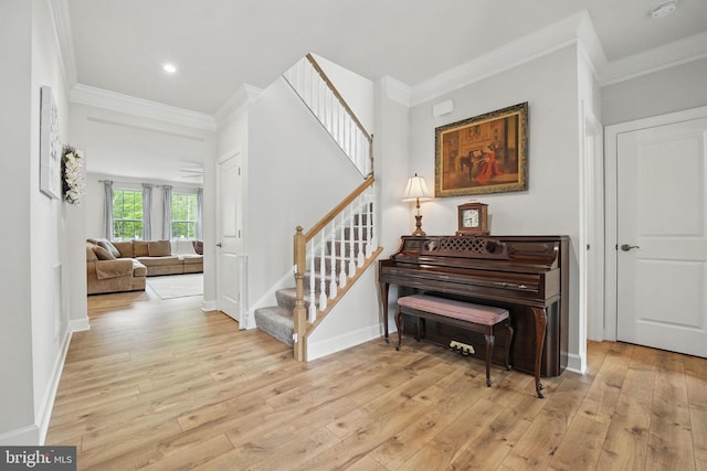 187 Boxelder Dr, Stafford, VA 22554 - stairway featuring wood-type flooring, baseboards, ornamental molding, and recessed lighting