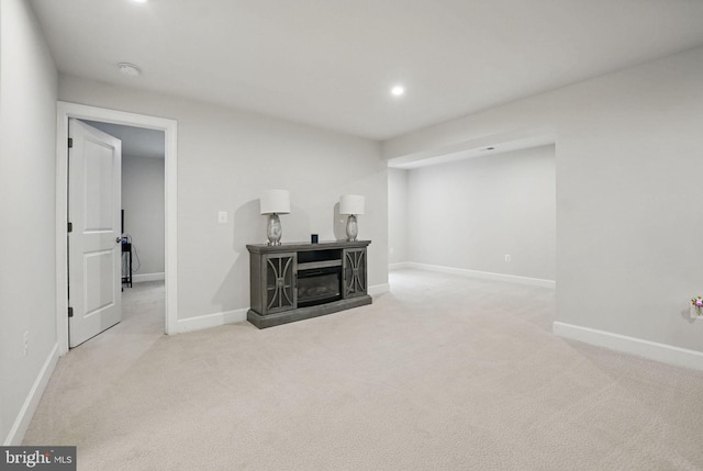 187 Boxelder Dr, Stafford, VA 22554 - finished below grade area with recessed lighting, a glass covered fireplace, carpet, and baseboards