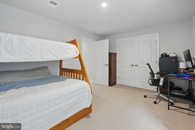 187 Boxelder Dr, Stafford, VA 22554 - bedroom featuring a closet, visible vents, and light carpet