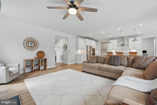 187 Boxelder Dr, Stafford, VA 22554 - living area featuring recessed lighting, light wood-type flooring, a ceiling fan, and baseboards