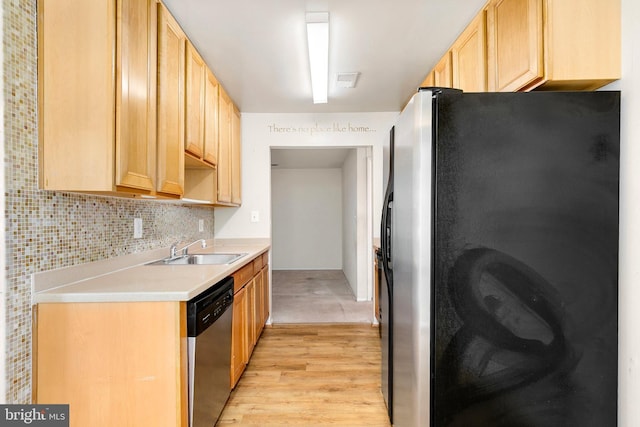 8131 Needwood Rd Unit 102, Derwood, MD 20855 - kitchen with appliances with stainless steel finishes, a sink, light wood finished floors, and light brown cabinets