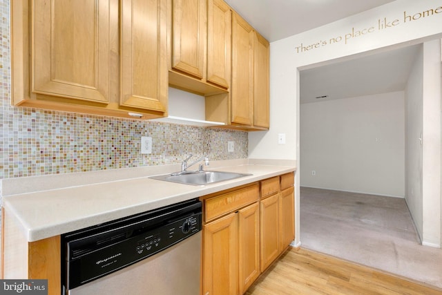 8131 Needwood Rd Unit 102, Derwood, MD 20855 - kitchen with dishwasher, a sink, backsplash, light countertops, and light colored carpet