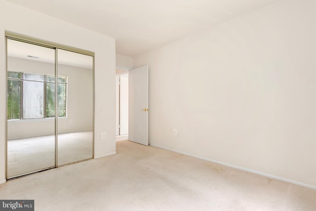 8131 Needwood Rd Unit 102, Derwood, MD 20855 - unfurnished bedroom featuring carpet floors, a closet, and baseboards