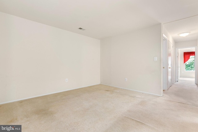 8131 Needwood Rd Unit 102, Derwood, MD 20855 - spare room with light carpet and baseboards