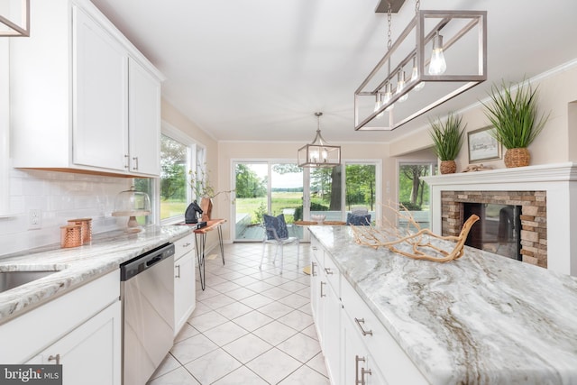 3188 Windrows Way, Eden, MD 21822 - kitchen with dishwasher, white cabinetry, a stone fireplace, healthy amount of natural light, and crown molding