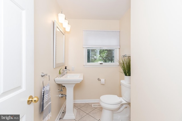 3188 Windrows Way, Eden, MD 21822 - bathroom featuring toilet, tile patterned floors, baseboards, and a sink