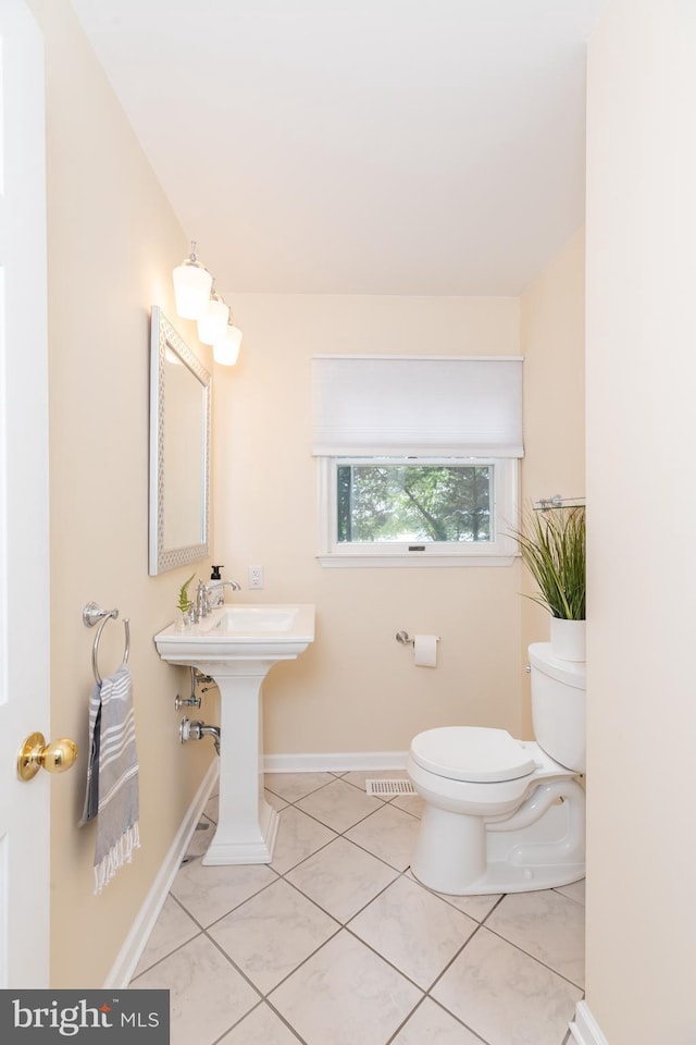 3188 Windrows Way, Eden, MD 21822 - half bath with toilet, tile patterned flooring, and baseboards