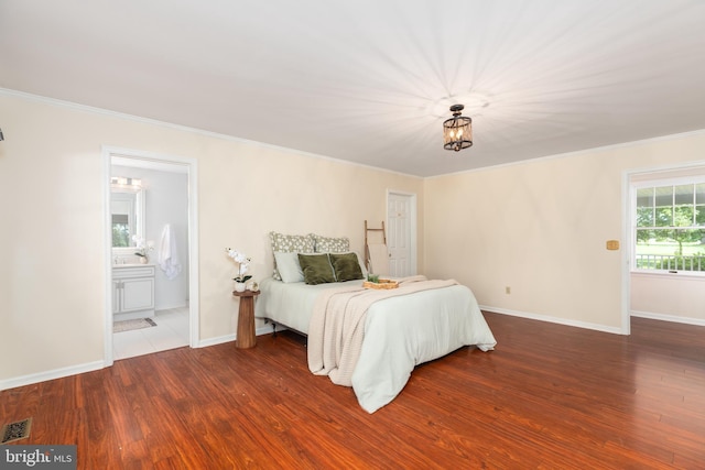 3188 Windrows Way, Eden, MD 21822 - bedroom featuring wood finished floors, crown molding, baseboards, and connected bathroom