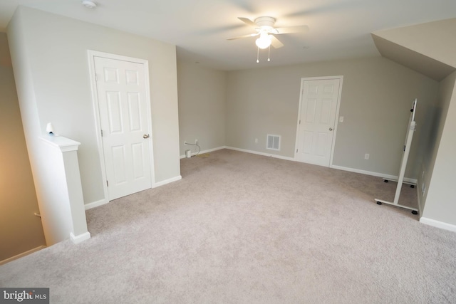 unfurnished bedroom with baseboards, visible vents, ceiling fan, and carpet flooring