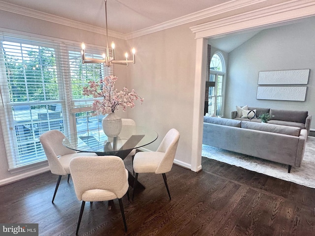 dining area with baseboards, dark wood finished floors, crown molding, and a notable chandelier