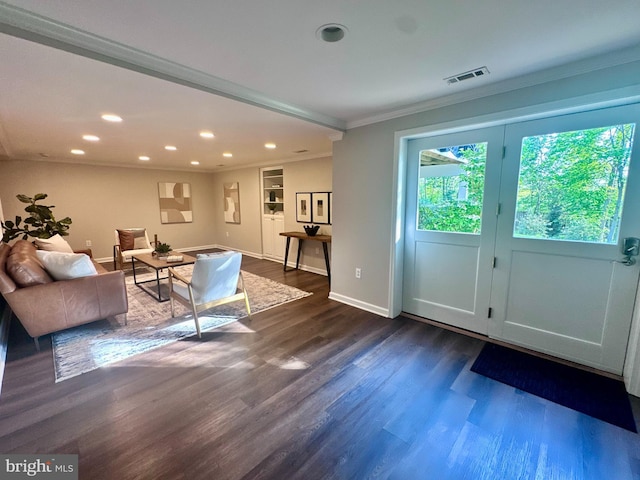 living area with crown molding, visible vents, baseboards, recessed lighting, and dark wood finished floors