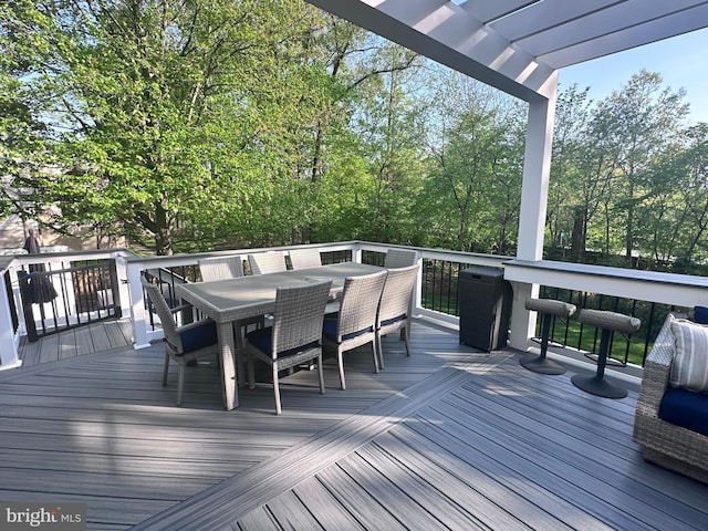 deck with outdoor dining space