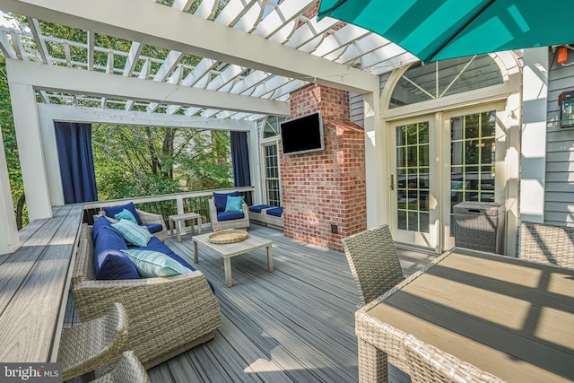 wooden deck with a pergola and an outdoor living space