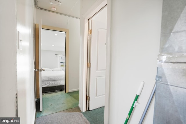 corridor with carpet floors