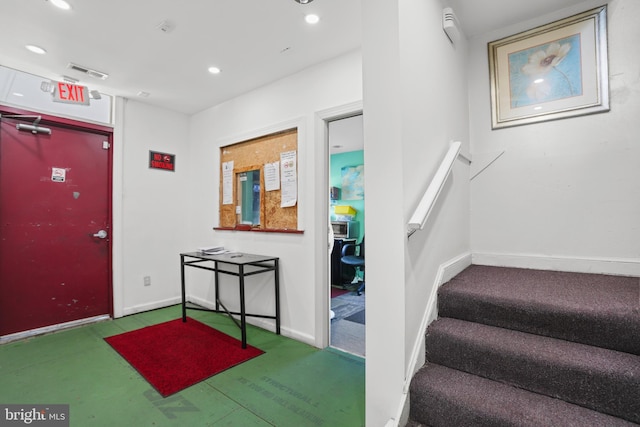 interior space with visible vents, recessed lighting, baseboards, and carpet floors