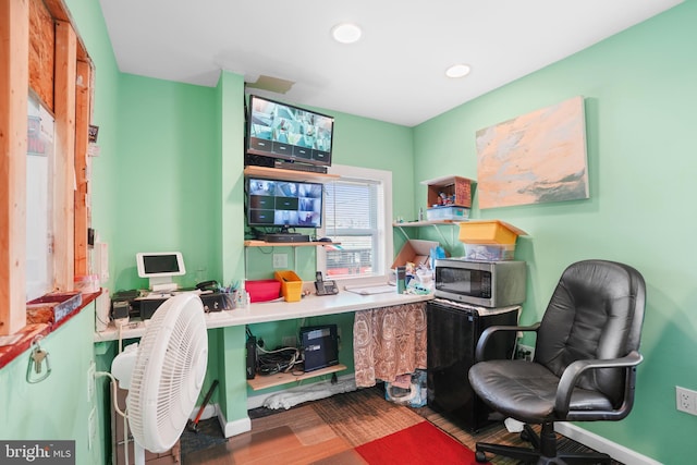 office featuring recessed lighting, baseboards, and wood finished floors