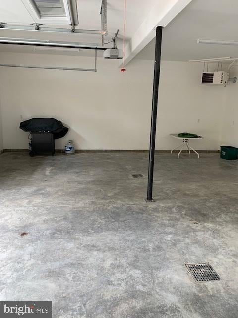 216 Tarn Dr, Oakland, MD 21550 - garage featuring a garage door opener