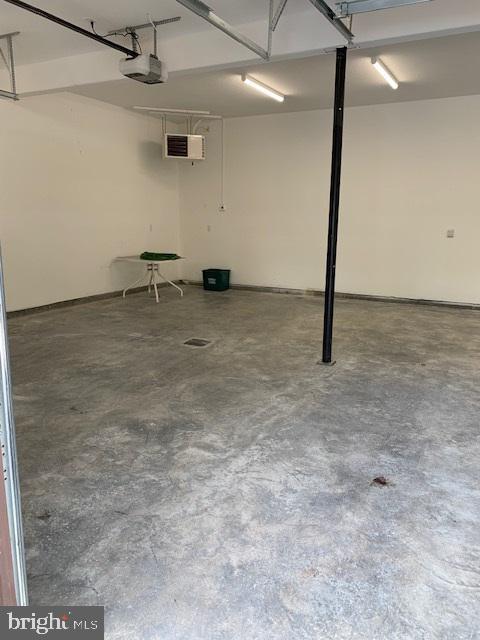 216 Tarn Dr, Oakland, MD 21550 - garage with a garage door opener