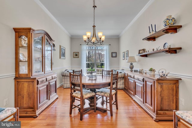 23700 Quiet Oak Ct, California, MD 20619 - dining room featuring an inviting chandelier, ornamental molding, and light wood-type flooring