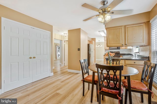 10866 Monticello Ct, Great Falls, VA 22066 - dining space with a ceiling fan, light wood-style flooring, and baseboards