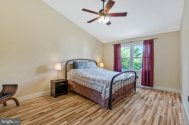 10866 Monticello Ct, Great Falls, VA 22066 - bedroom featuring vaulted ceiling, baseboards, light wood-type flooring, and ceiling fan