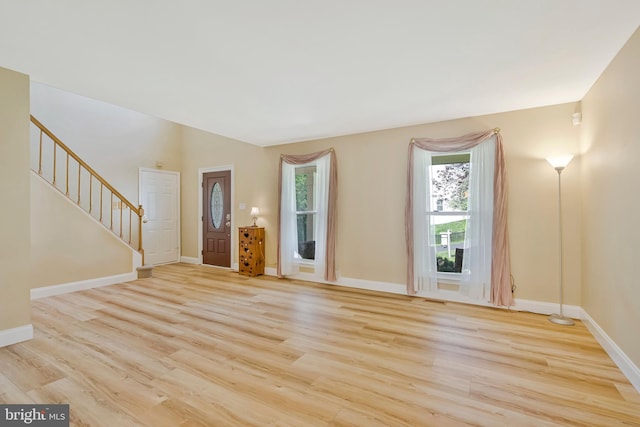 10866 Monticello Ct, Great Falls, VA 22066 - foyer entrance featuring stairs, light wood finished floors, and baseboards
