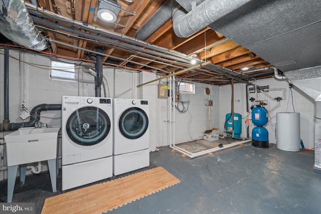 5004 Kennett Pike, Wilmington, DE 19807 - basement with a water pressure tank, independent washer and dryer, and a sink