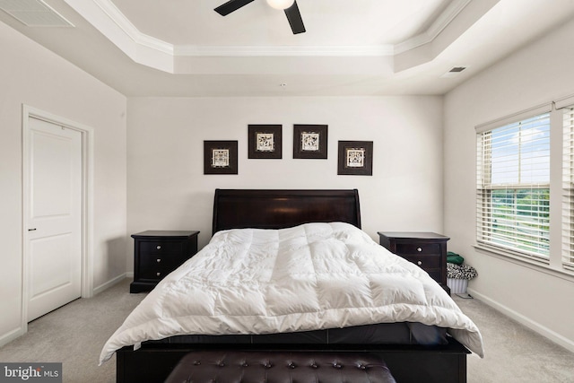 719 Thurlow Ct, Bel Air, MD 21014 - carpeted bedroom with ornamental molding, a tray ceiling, baseboards, and visible vents