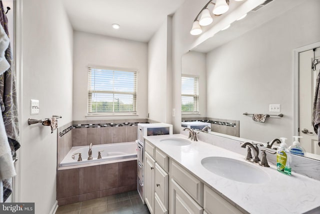 719 Thurlow Ct, Bel Air, MD 21014 - bathroom with tile patterned flooring, a bath, visible vents, and a sink