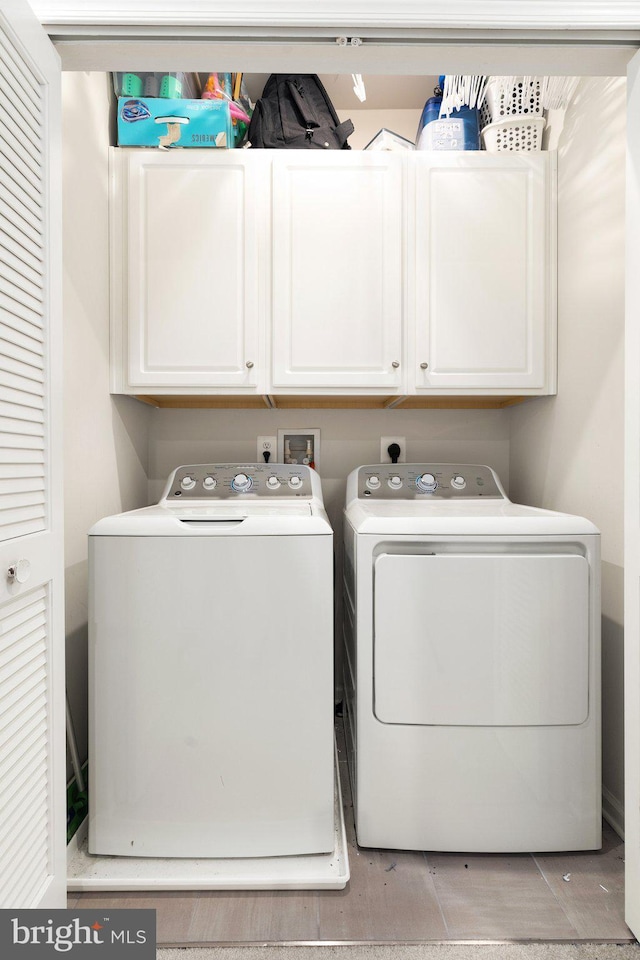 719 Thurlow Ct, Bel Air, MD 21014 - washroom featuring cabinet space and washer and clothes dryer