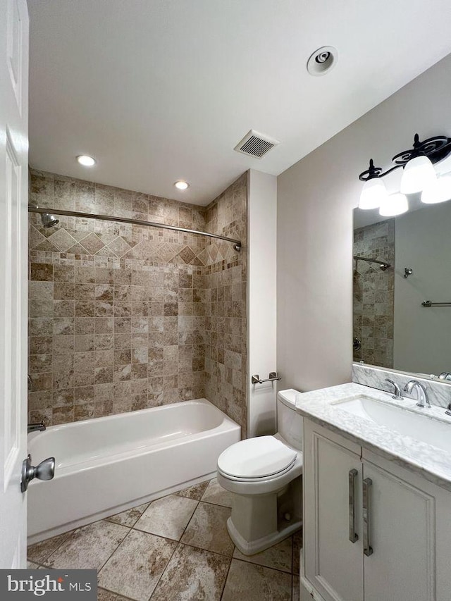 820 S Paca St, Baltimore, MD 21230 - full bath featuring bathtub / shower combination, tile patterned floors, toilet, vanity, and visible vents