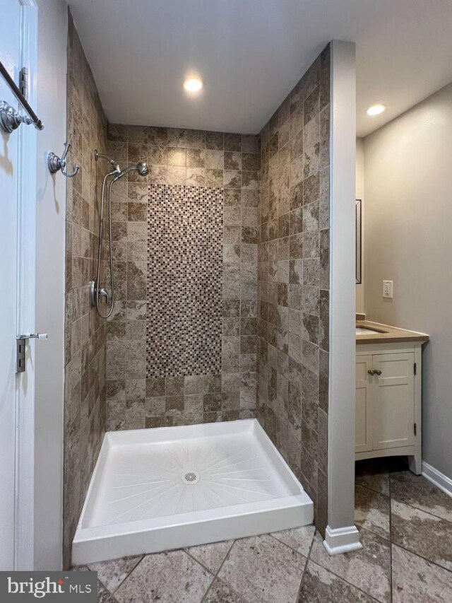 820 S Paca St, Baltimore, MD 21230 - full bath with baseboards, a stall shower, recessed lighting, and vanity