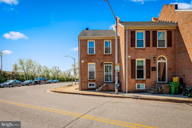 820 S Paca St, Baltimore, MD 21230 - townhome / multi-family property with brick siding and roof with shingles