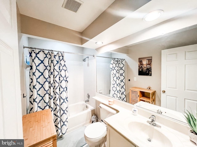 full bathroom with shower / bath combo, toilet, vanity, and visible vents