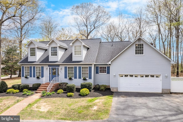 5855 Springmount Ct, Eldersburg, MD 21784 - new england style home with aphalt driveway, a front yard, and roof with shingles